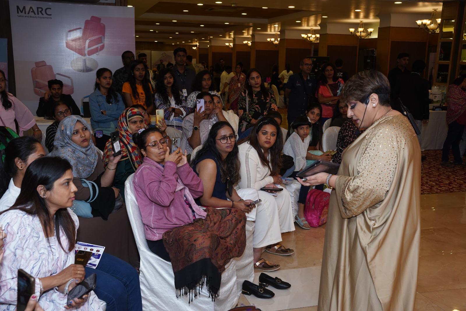 Beauty professionals watching a product demonstration at a previous BBD edition
