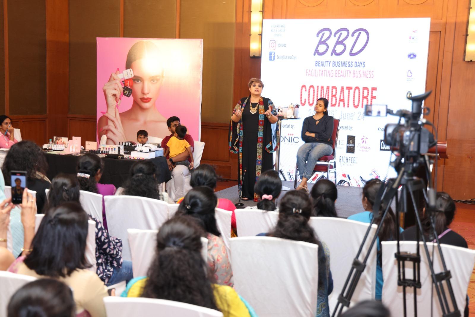 A speaker addressing beauty professionals at a previous BBD event